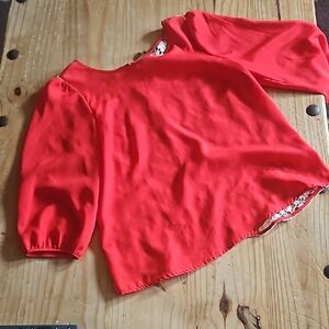 Chic Red Blouse with Floral Lining